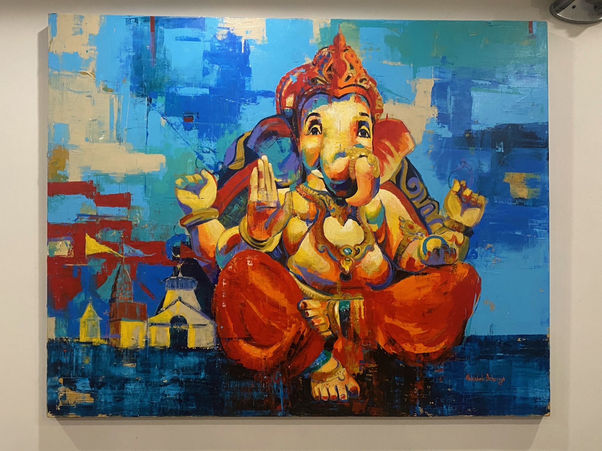 A captivating and colorful Ganesha painting that showcases the vibrant essence of the revered Hindu deity