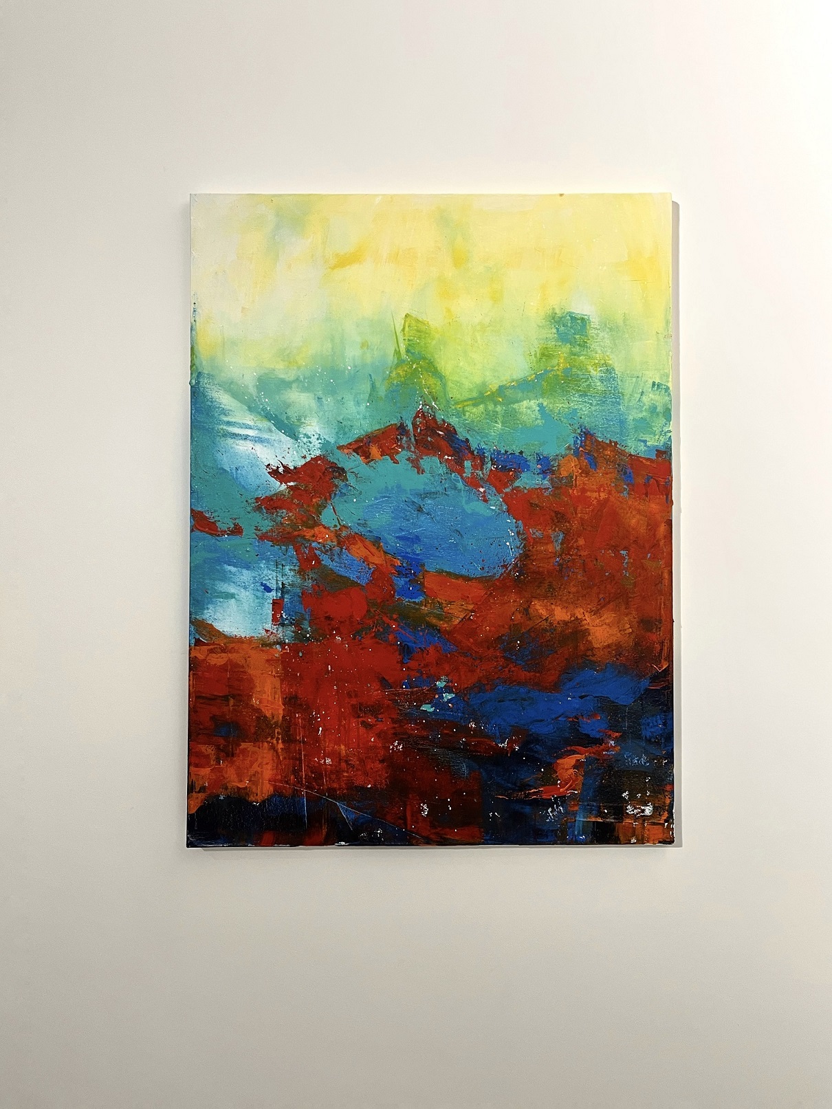 Vibrant Fusion: Textured Abstract Painting in Yellow, Blue, and Red